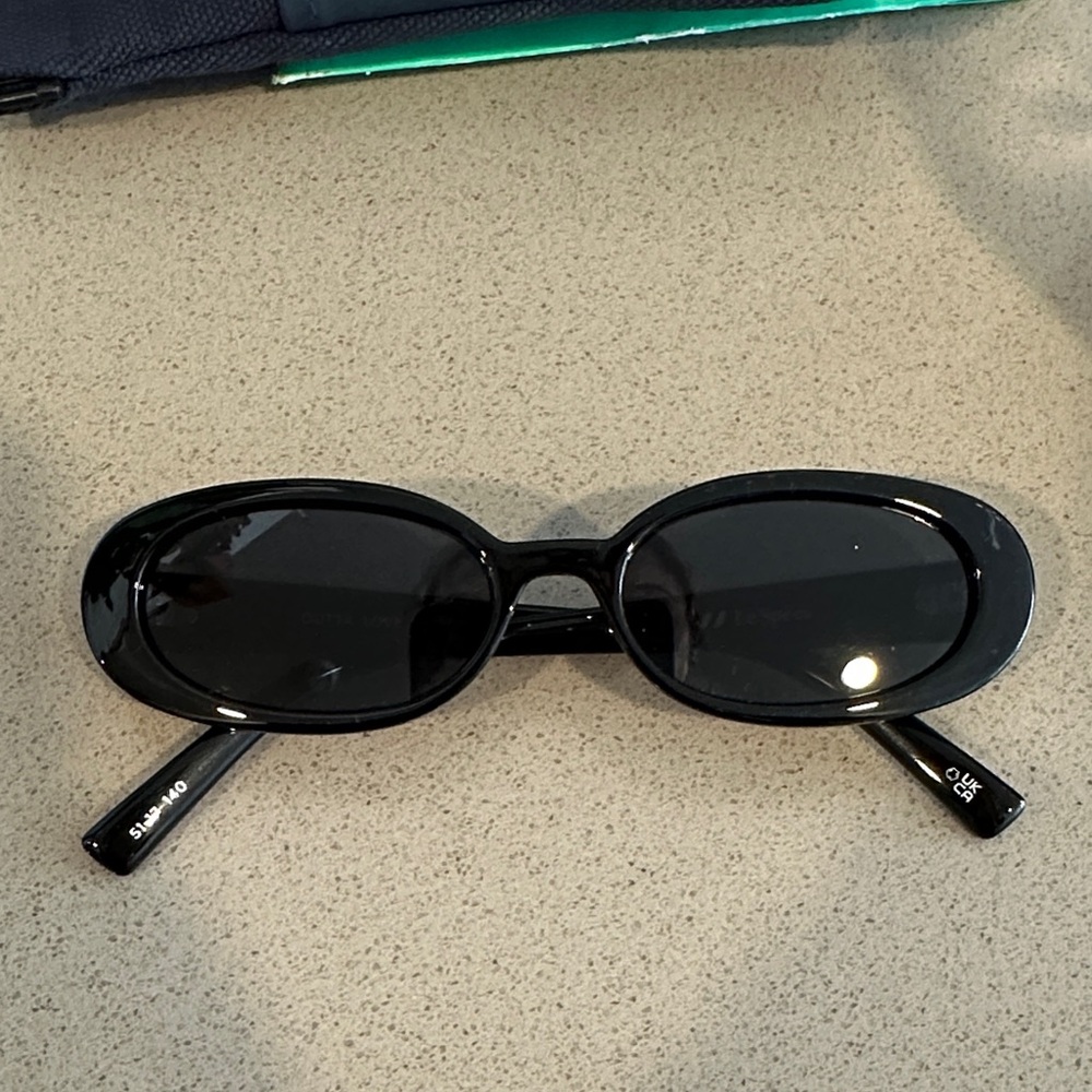 Le Specs Glossy Black Oval Sunglasses